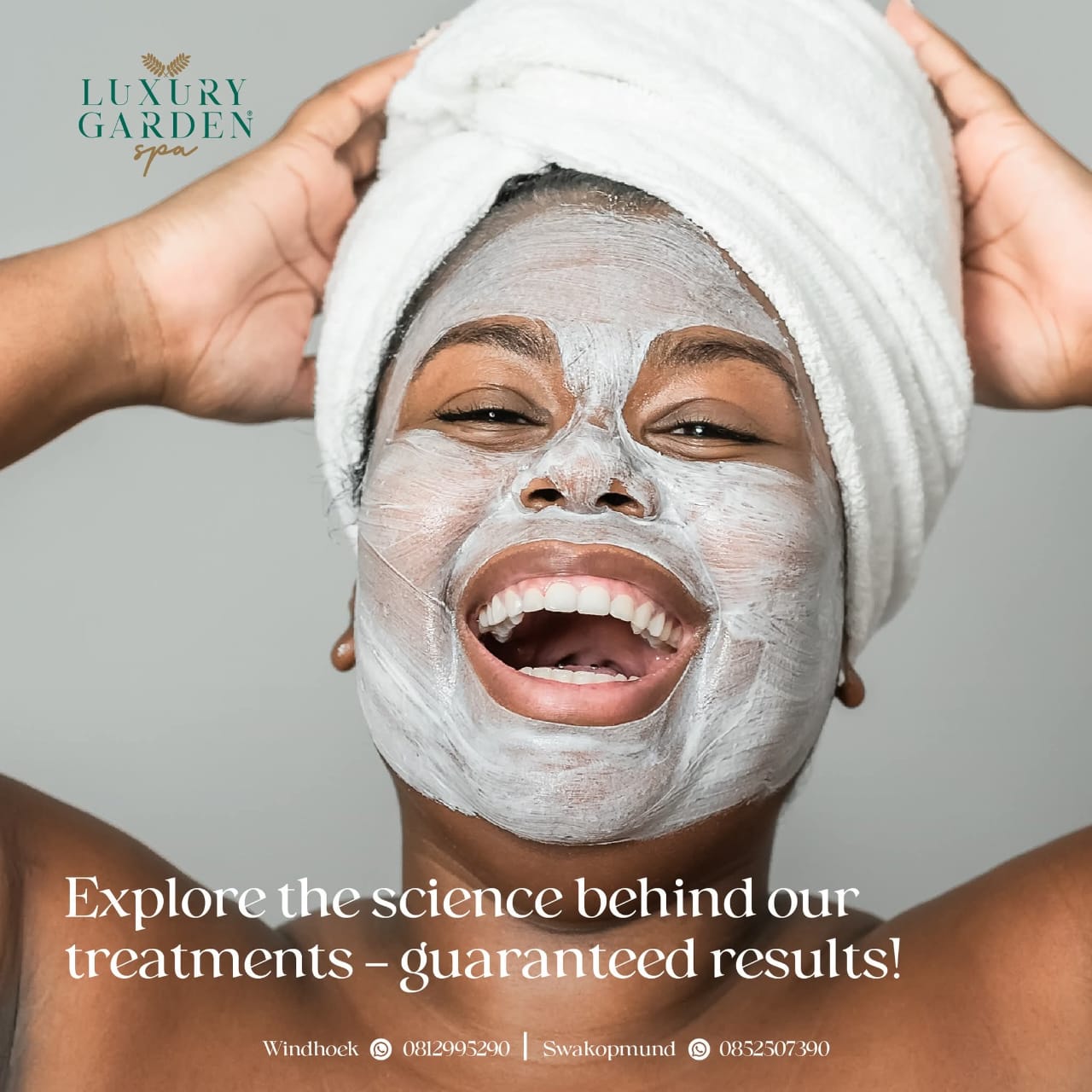 Guest laughing during a brightening facial mask treatment